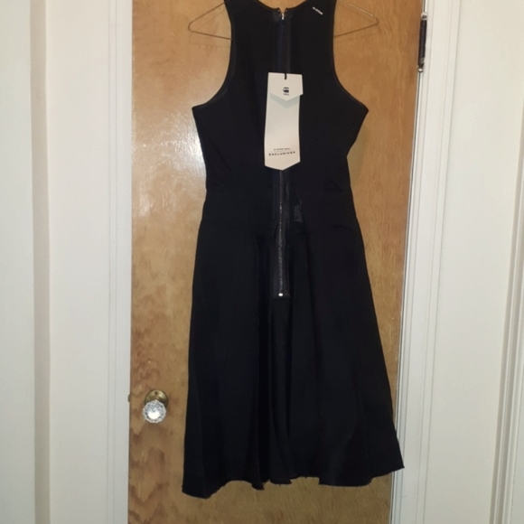 NWT SZ small denim. Pleated skirt. Black in color. Not a lot of give is this - Picture 2 of 6